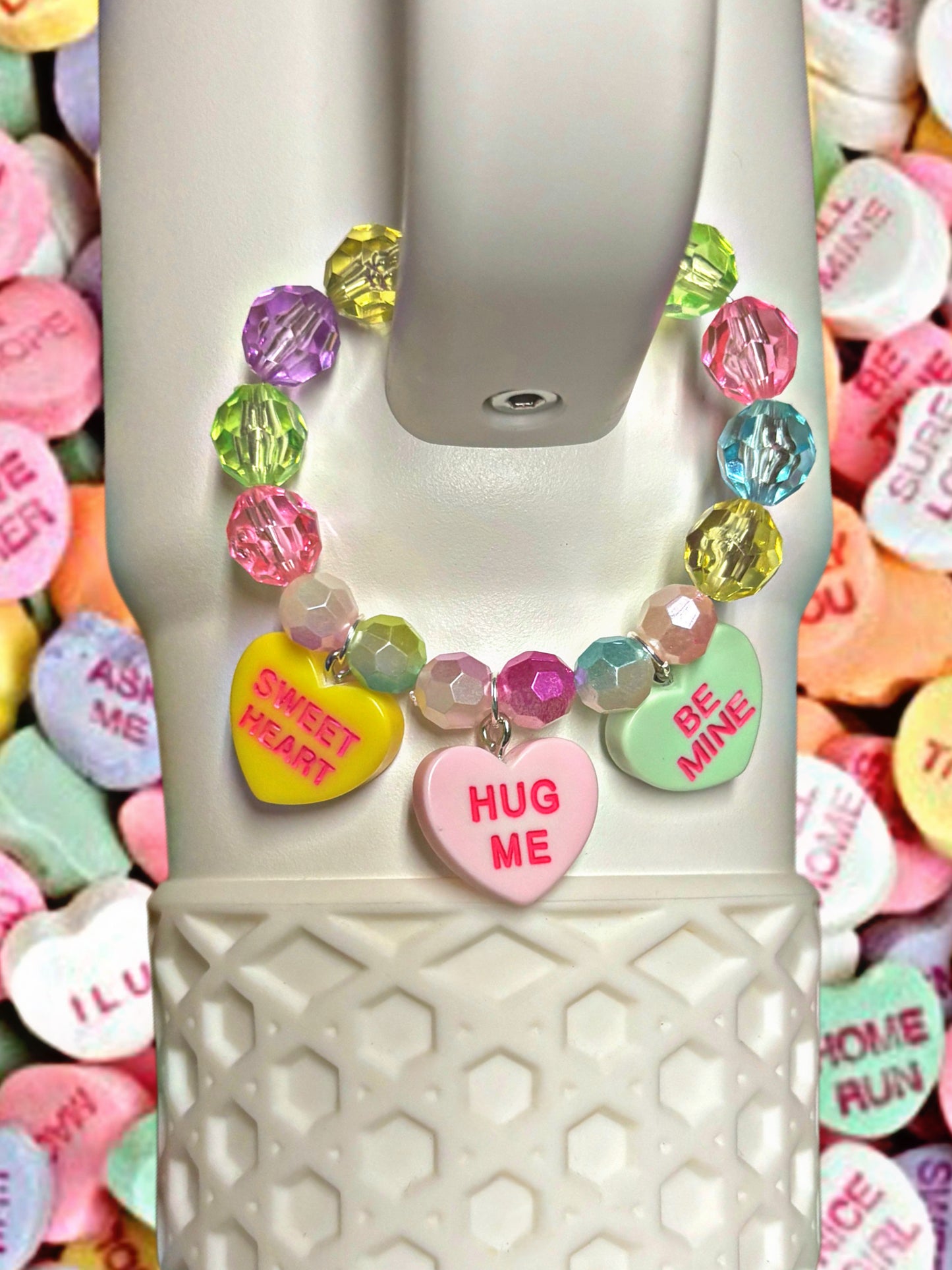 Conversation Hearts Magnetic Handle Charm. Colors and words may vary.