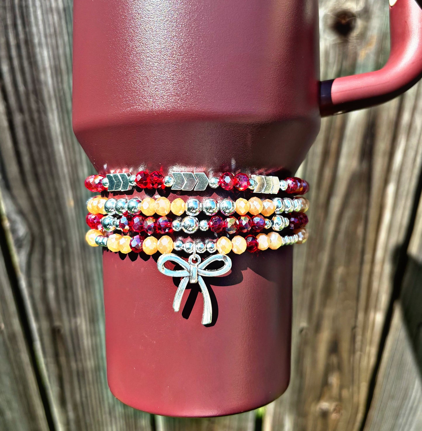 Bracelets de la Coupe Stanley Cabernet Rouge.