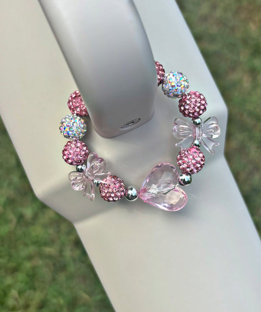Charm poignée coeur et noeuds roses