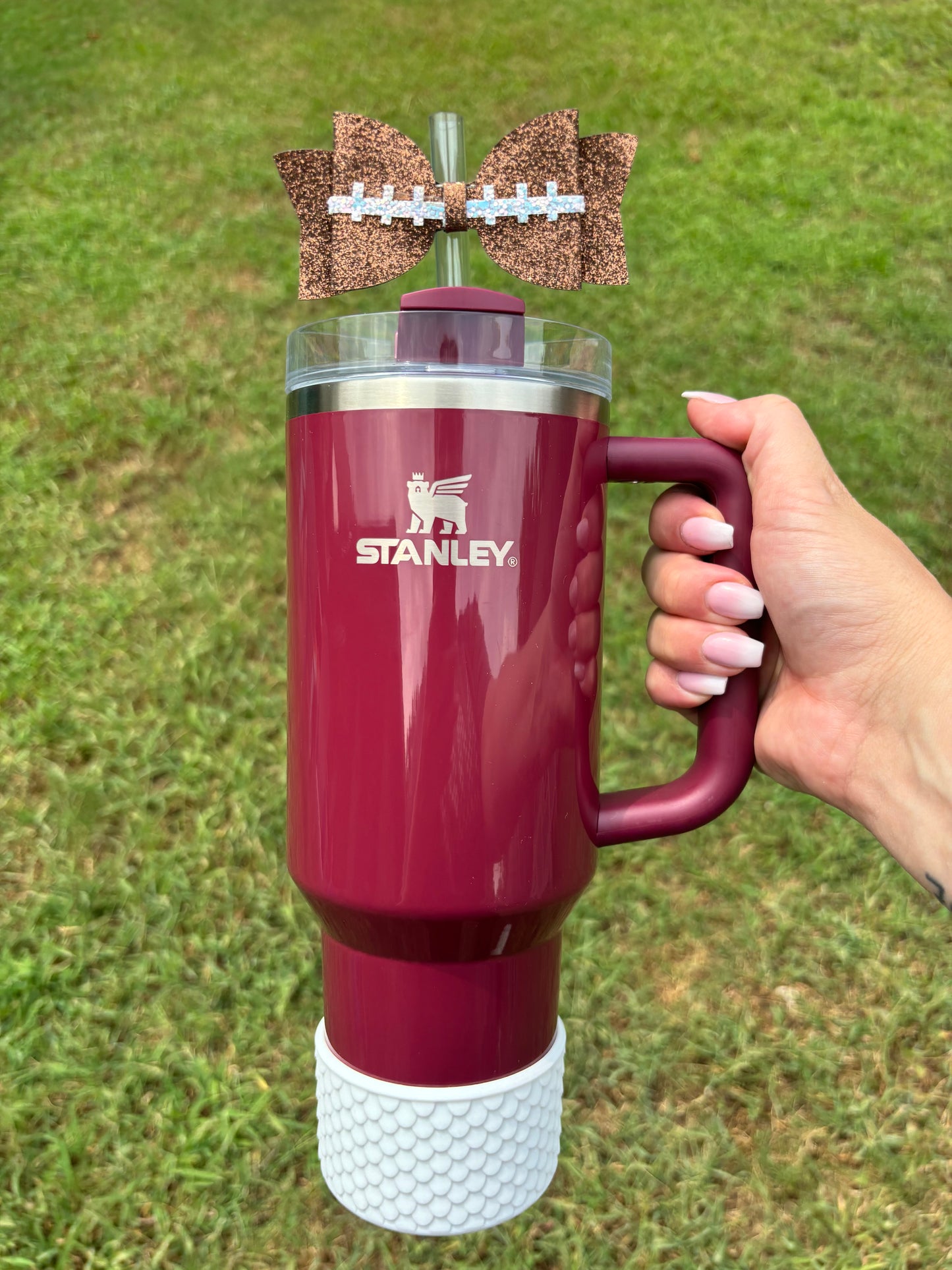 Topper de paille avec nœud à paillettes en forme de football