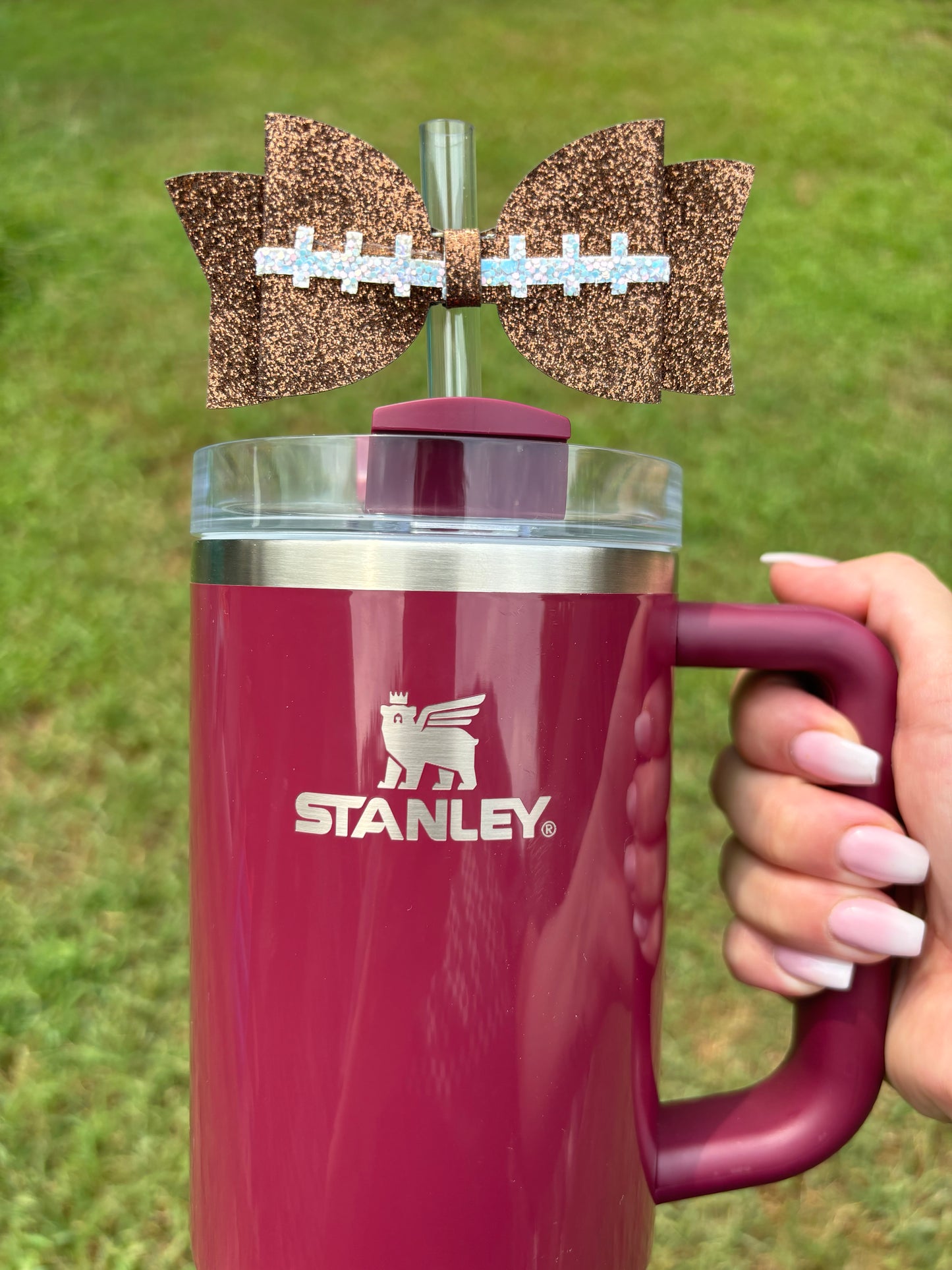 Topper de paille avec nœud à paillettes en forme de football