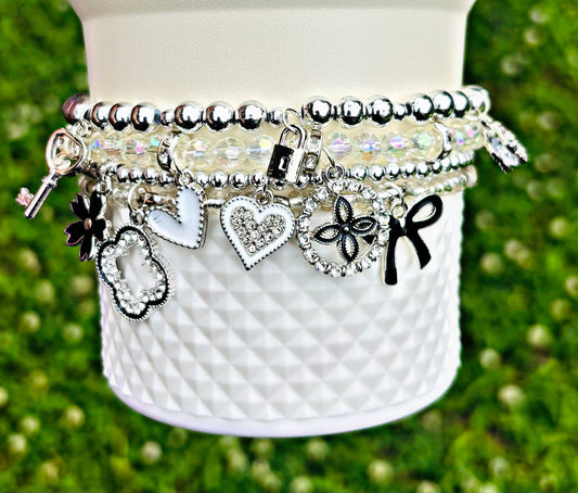 Chanel Silver Lux Cup Bracelets. Dior. Louis Vuitton.