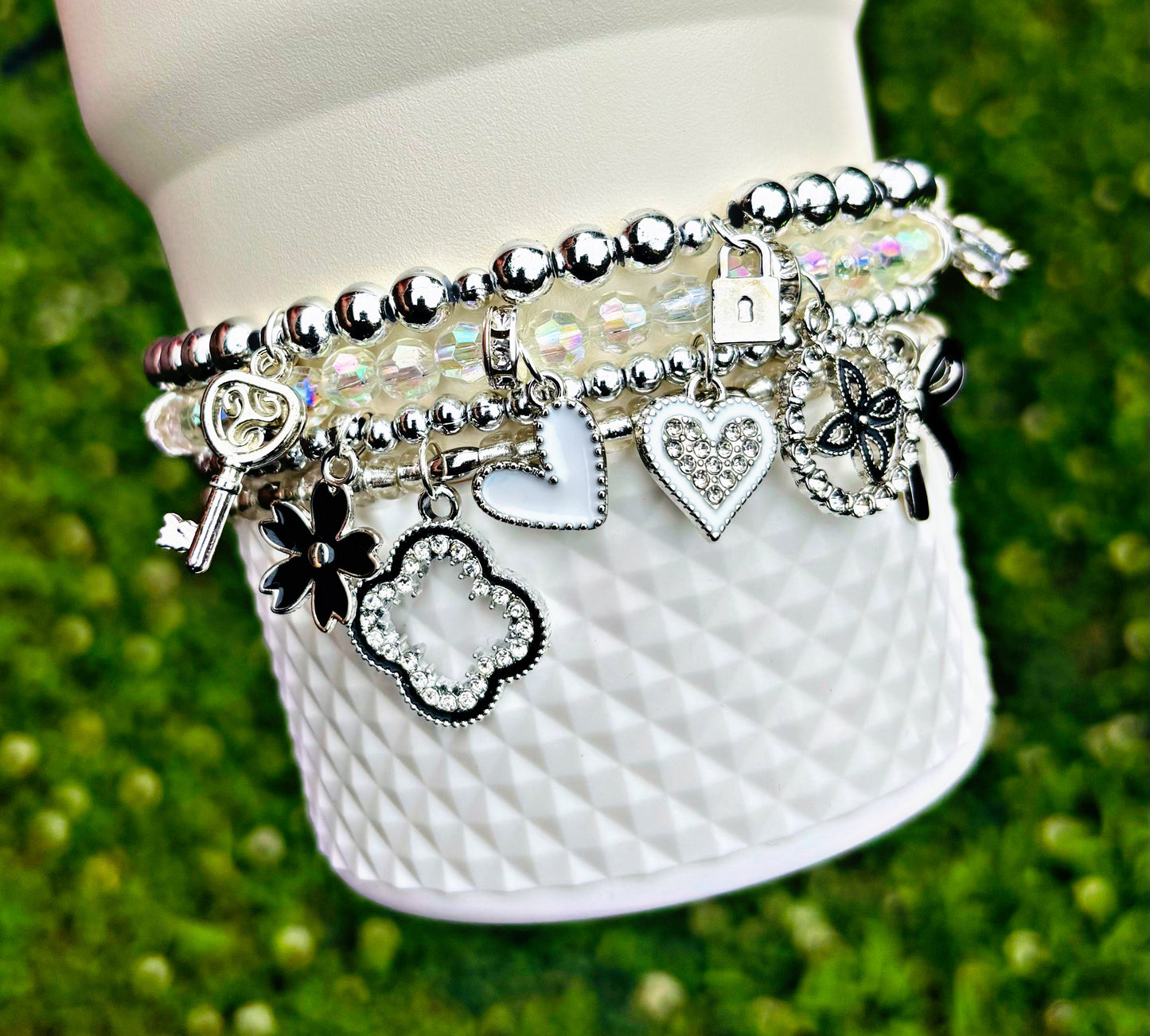 Chanel Silver Lux Cup Bracelets. Dior. Louis Vuitton.