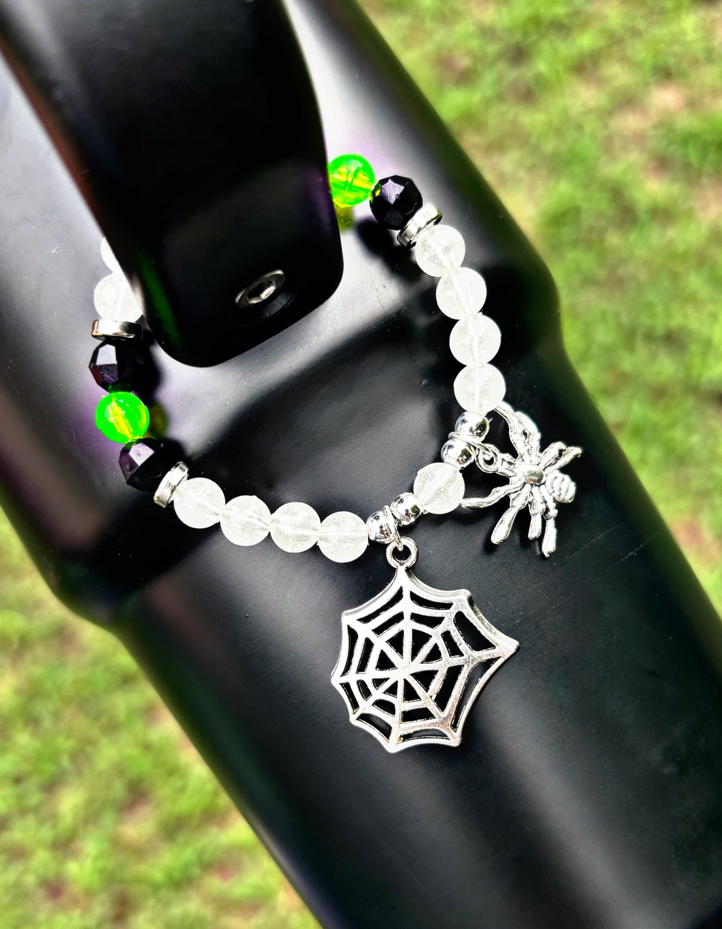 Web Glow Handle Charm. GLOWS IN THE DARK!